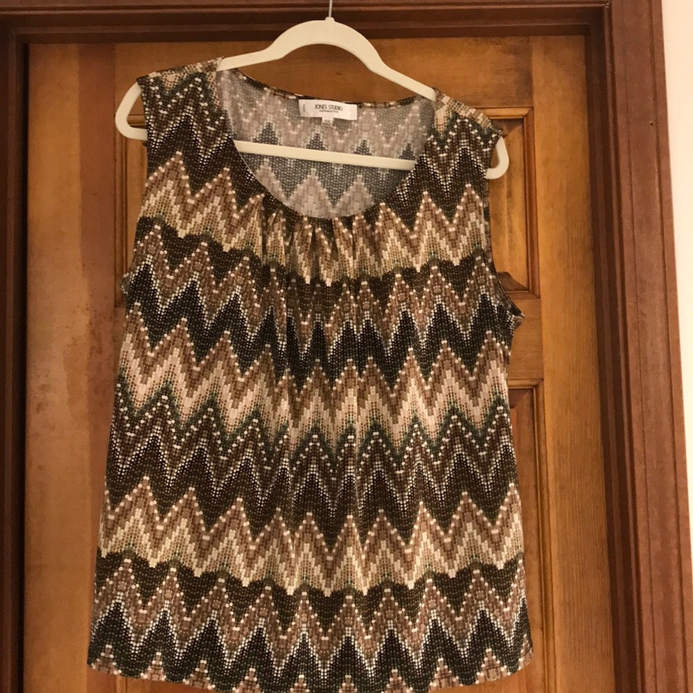 Tank style blouse. Neutral colors.